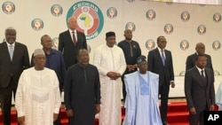 Nigeria President, Bola Ahmed Tinubu, second from left, poses , for a group photograph with other West Africa leaders after a meeting in Abuja Nigeria, July 30, 2023. 