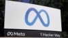 FILE - Facebook's Meta logo sign is seen at the company headquarters in Menlo Park, Calif., Oct. 28, 2021. The company said on Aug. 1, 2023, that it will ask EU-based users for consent before allowing targeted advertising on its social networks. 