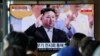 A TV screen shows an image of North Korean leader Kim Jong Un at a military parade to mark the 70th anniversary of the armistice that halted fighting in the 1950-53 Korean War, during a news program at the Seoul Railway Station in Seoul, South Korea, July 28, 2023. 