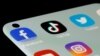FILE - Facebook, TikTok, Twitter, YouTube and Instagram apps are seen on a smartphone in this illustration taken July 13, 2021.