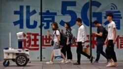 VOA Asia - Tariff debates