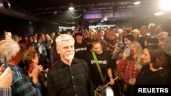 Presidential candidate and former Chairman of the NATO Military Committee and Czech Army General Petr Pavel arrives at a rock club in Prague, Czech Republic, Jan. 9, 2023.