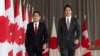 Kryeministrat kanadez dhe japonez duke ecur drejt konferencës së përbashkët për shtyp në Otavë (12 janar 2023)
