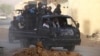 Free Syrian Army fighters on a pick-up truck, head towards the frontline where clashes with forces loyal to Syria's President Bashar al-Assad are taking place, in Damascus, May 5, 2013. 