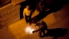 Israeli soldiers arrest Abdel Aziz Dweik, speaker of the long-defunct Palestinian parliament and a senior Hamas figure, at his home during a military operation to search for three missing Israeli teenagers, in the West Bank city of Hebron, June 16, 2014.