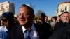 FILE - Itamar Ben Gvir, Israel's new Minister of National Security and leader of the far-right Otzma Yehudit (Jewish Power) party, arrives to visit Jerusalem's Mahane Yehuda market on Dec. 30, 2022. 