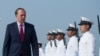 FILE - Australian Minister of Immigration and Border Protection Peter Dutton inspects guards of honor during a ceremony for the arrival of the first Malaysia Maritime Enforcement Agency bay class vessel in Port Klang, outside Kuala Lumpur, Malaysia, Feb. 27, 2015. 