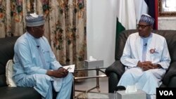 Aliyu Mustapha Sokoto (Hagu) da Shugaba Muhammadu Buhari (Dama) yayin tattaunawar