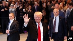 FILE - President-elect Donald Trump assails Democrat Hillary Clinton for joining an effort to recount votes in three closely contested states that Trump won.