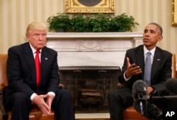 FILE - President Barack Obama meets with President-elect Donald Trump at the White House.