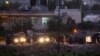 Israeli soldiers stand next to their vehicles in the village of Halhul, near the West Bank town of Hebron, where the bodies of the three missing Israeli teenagers were found, June 30, 2014. 