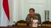 FILE - Indonesia's President Joko Widodo leads a cabinet meeting at the Presidential Palace in Jakarta, March 4, 2015.