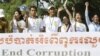 Social activists carry an anti-corruption banner during a rally in Phnom Penh, Cambodia.
