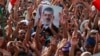 Supporters of ousted President Mohammed Morsi protest in Nasr City, Cairo, Egypt, July 9, 2013. 