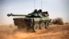 A French tank is seen heading north at the tail end of military convoy in Gao, northern Mali, Feb. 6, 2013.