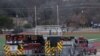Emergency responders are seen near a synagogue where a man has reportedly taken people hostage during services in Colleyville, Texas, Jan. 15, 2022. 