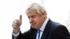 Britain's Prime Minister Boris Johnson gestures as he departs from Hudson Yards, in New York, Tuesday, Sept. 24, 2019.