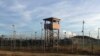 This Dec. 11, 2016, photo shows an unused guard tower at Camp Delta, one of the parts of the detention center at the U.S. naval base at Guantanamo Bay, Cuba, that is now vacant as the detainee population reaches 59, the lowest it has been since early 2002.