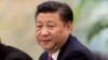 China's President Xi Jinping looks on during a meeting with Laos' Prime Minister Thongloun Sisoulith in Beijing, China, Dec. 1, 2016. 