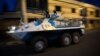 A United Nations armored personnel carrier patrols through the city of Goma following the sound of shell fire and gunshots on November 19, 2012. 