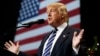 FILE - President-elect Donald Trump speaks during a rally at the Wisconsin State Fair Exposition Center in West Allis, Wisconsin, Dec. 13, 2016.