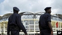 Angolan policemen patrol outside of Chiazi stadium in Cabinda, 11 Jan 2010