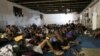 Migrantes em Trípoli