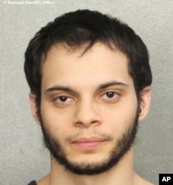 This booking photo provided by the Broward Sheriff's Office shows suspect Esteban Ruiz Santiago, 26, Jan. 7, 2017, in Fort Lauderdale, Fla.