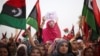 Libyan women celebrate the revolution against Moammar Gadhafi's regime and demand more rights.