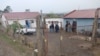 Police officials work at the scene of a mass shooting in Lusikisiki, South Africa, on Sept. 28, 2024. (South African Police Services via Reuters)