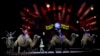 Ringling Bros. and Barnum & Bailey performers ride camels during a performance, Jan. 14, 2017, in Orlando, Fla. The Ringling Bros. and Barnum & Bailey Circus will end the "The Greatest Show on Earth" in May, following a 146-year run of performances. 