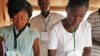 Electoral officials count ballot papers after the National Assembly election in Ibadan, Nigeria,Saturday, April 9, 2011. Nigeria's voters put their inked fingers to ballots Saturday for the first round in the nation's crucial April election, coming out 