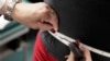 FILE - A subject's waist is measured during an obesity prevention study in Chicago, Illinois, Jan. 20, 2010. The U.S. obesity rate is about 40%, according to a 2021-2023 survey of about 6,000 people.