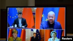 European Commission President Ursula von der Leyen, European Council President Charles Michel, German Chancellor Angela Merkel, French President Emmanuel Macron and Chinese President Xi Jinping hold a video conference, Dec. 30, 2020.