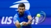 Novak Đoković u akciji na stadionu Bili Džin King u Njujorku (Foto: AFP/Corey SIPKIipkin)